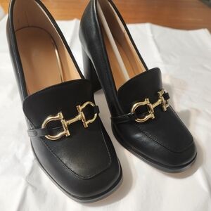 Chic Black Heels with Gold Detailing